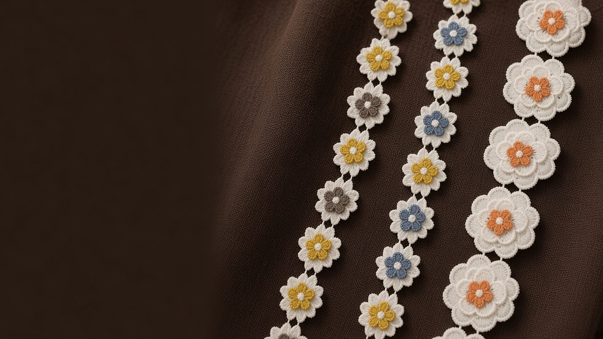 Floral embroidered daisy and rose lace trims on espresso linen